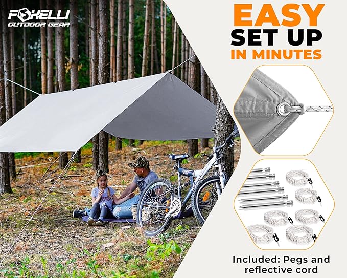 Foxelli Camping Tarp - 12x10ft Waterproof Rain Tarp, Lightweight Backpacking Rainfly Shelter with Included Extra Long Guy Lines & Stakes